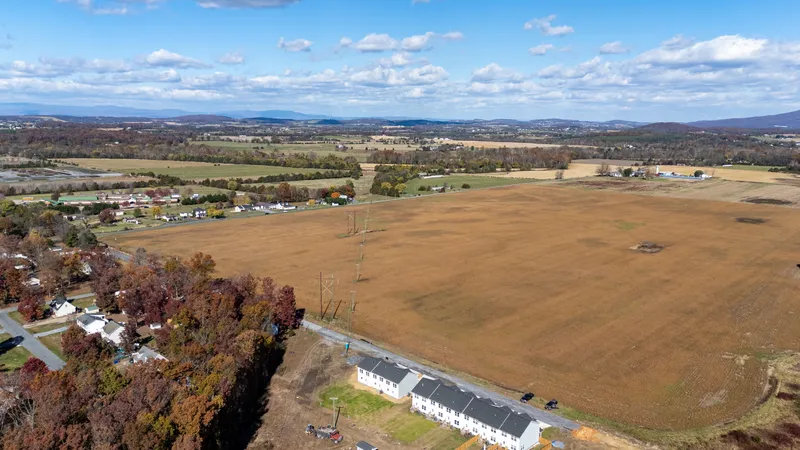Aerial view of Forest Station townhomes with the Shenandoah Valley and Blue Ridge mountains in the distance