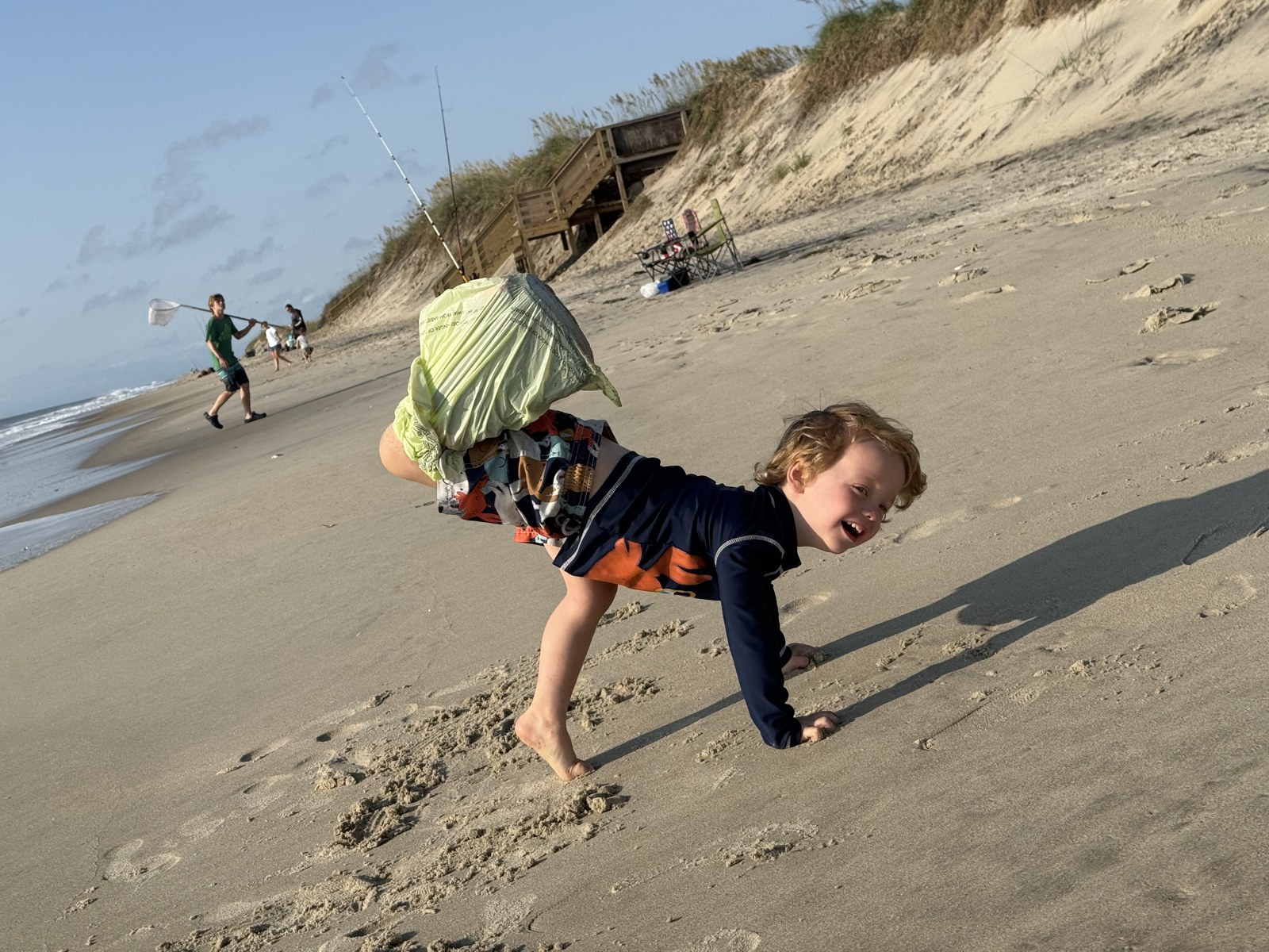 Sawyer on the sand at Cape Hatteras, one week after breaking his foot
